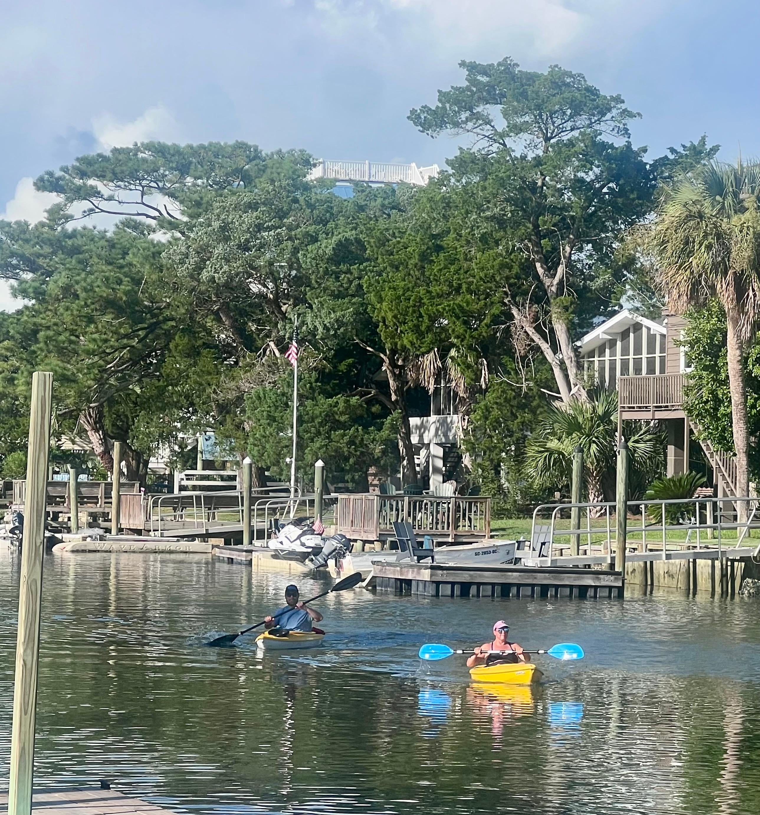 Back yard - canal view with us using kayaks.