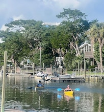 Back yard - canal view with us using kayaks.