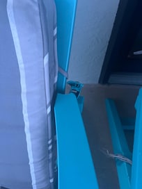 Broken chair on balcony