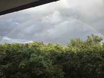 Beautiful rainbow after a quick shower our last day.  Taken from hallway outside unit.