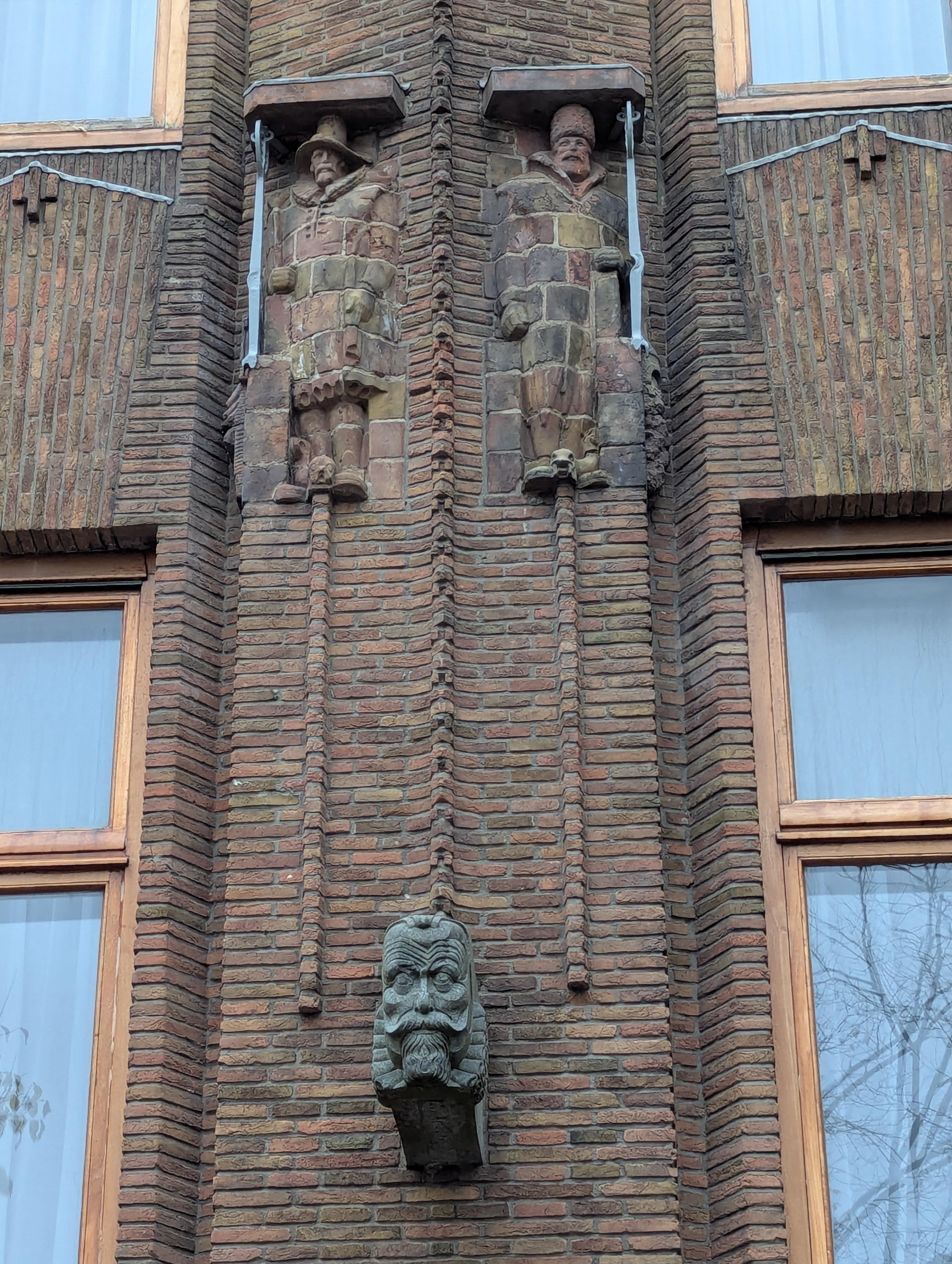 Carvings on the outside of the building.