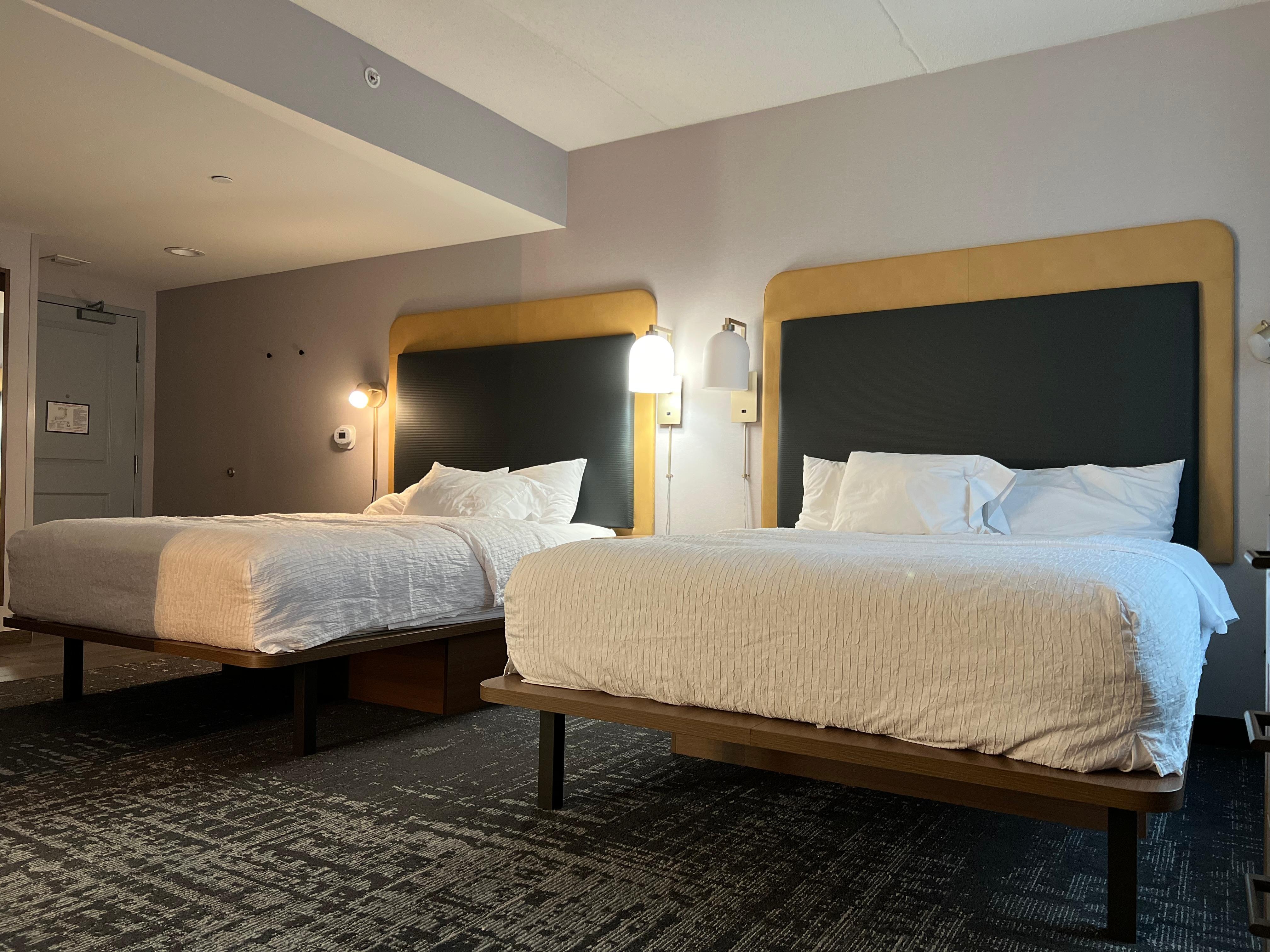 We stood in the 2 queen bed suite and it was very clean. The mattresses were comfortable! 