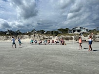 Fun at the beach right in front of the house.