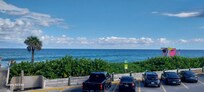 Looking out at beach from outdoor breakfast area.