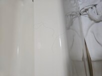 Long hair on the tub...I barely have any hair so I knew it wasn't mine.