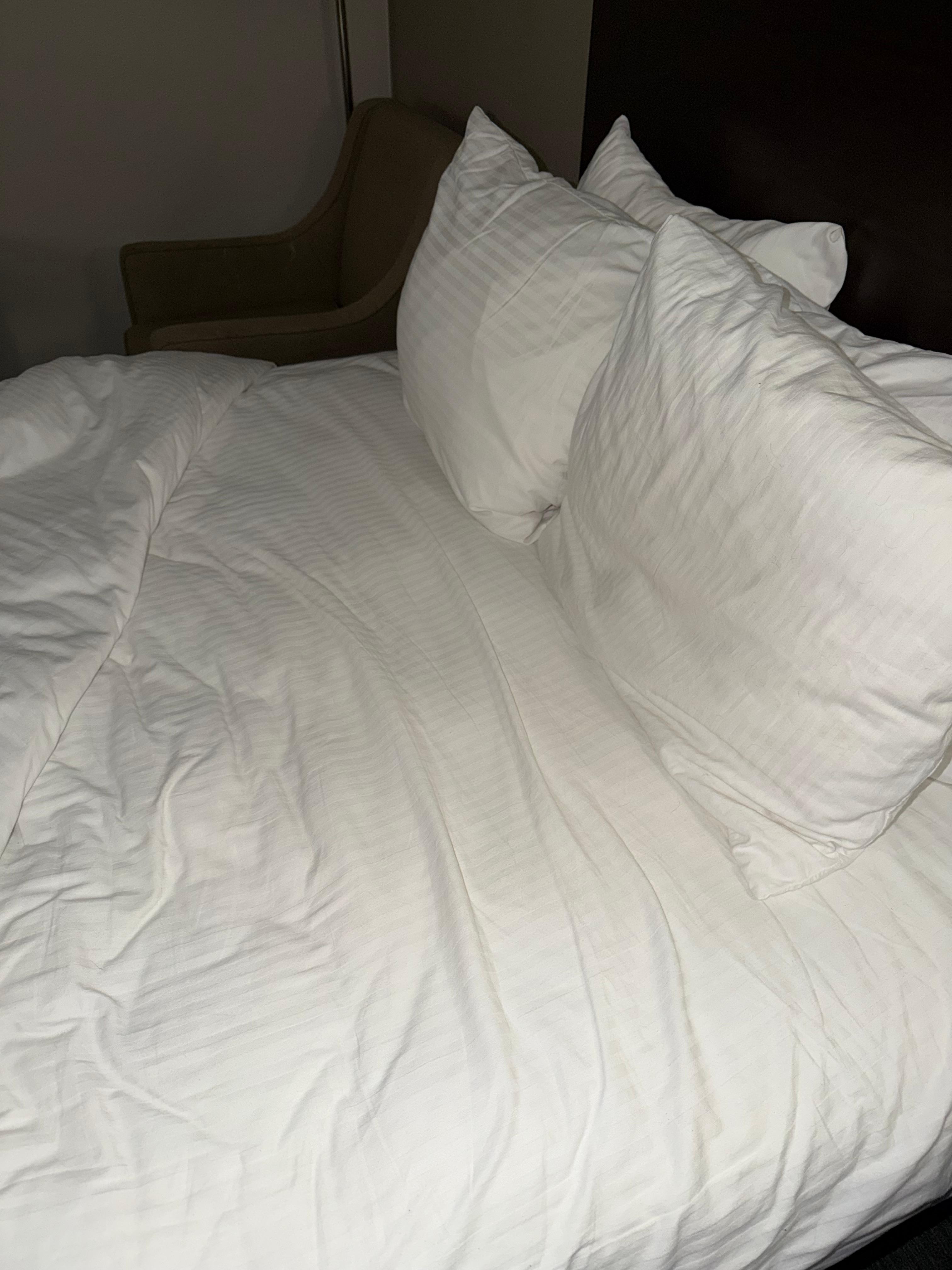 Dirty used sheets from the previous guest. This was tucked under the duvet.