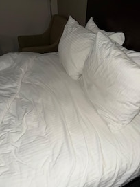 Dirty used sheets from the previous guest. This was tucked under the duvet.