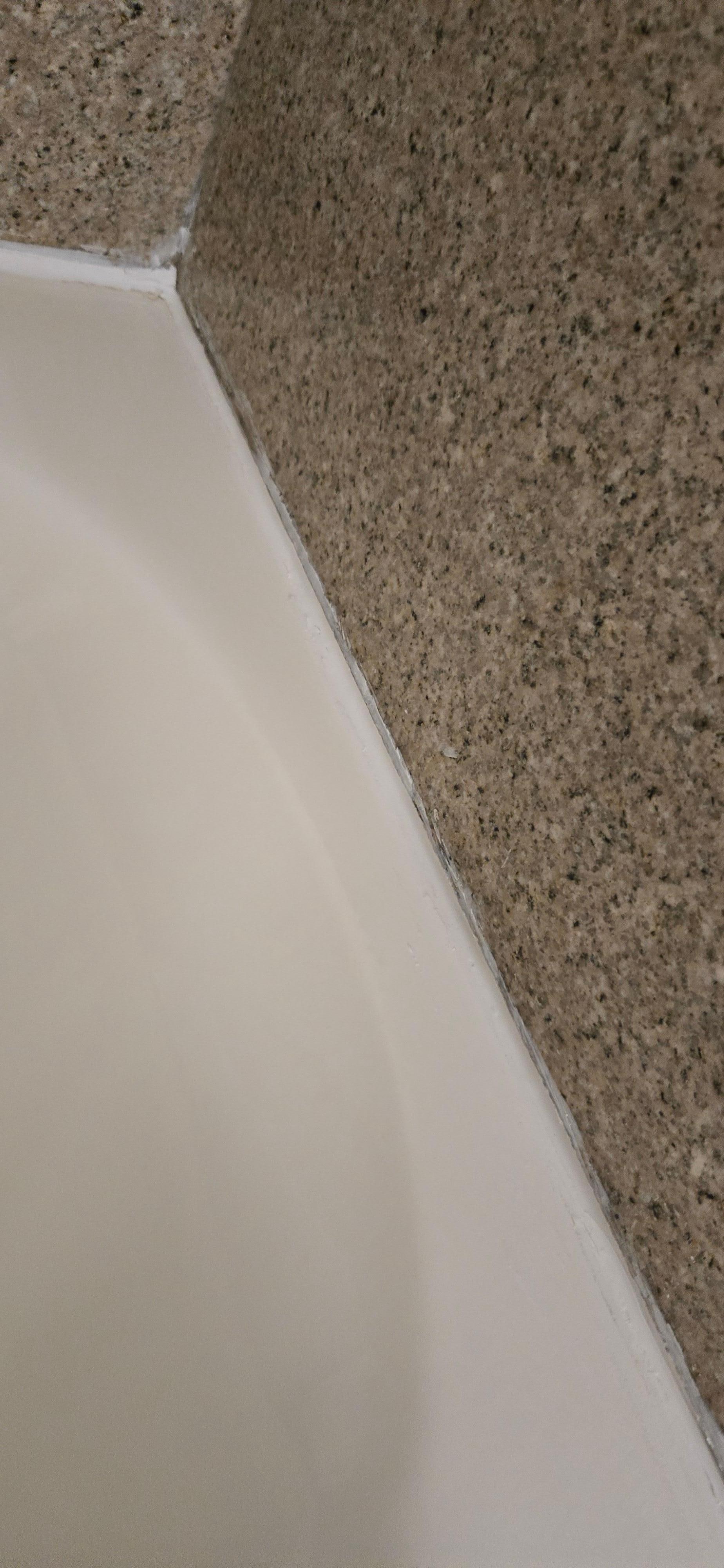 Quality of caulking was sloppy. 