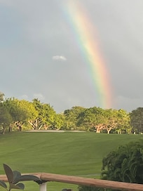 Sitting on the lower deck with a view of the golf course and looking for the pot of gold…😂