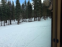 At the top of the parking lot you can ski in and out without trudging through too much snow.