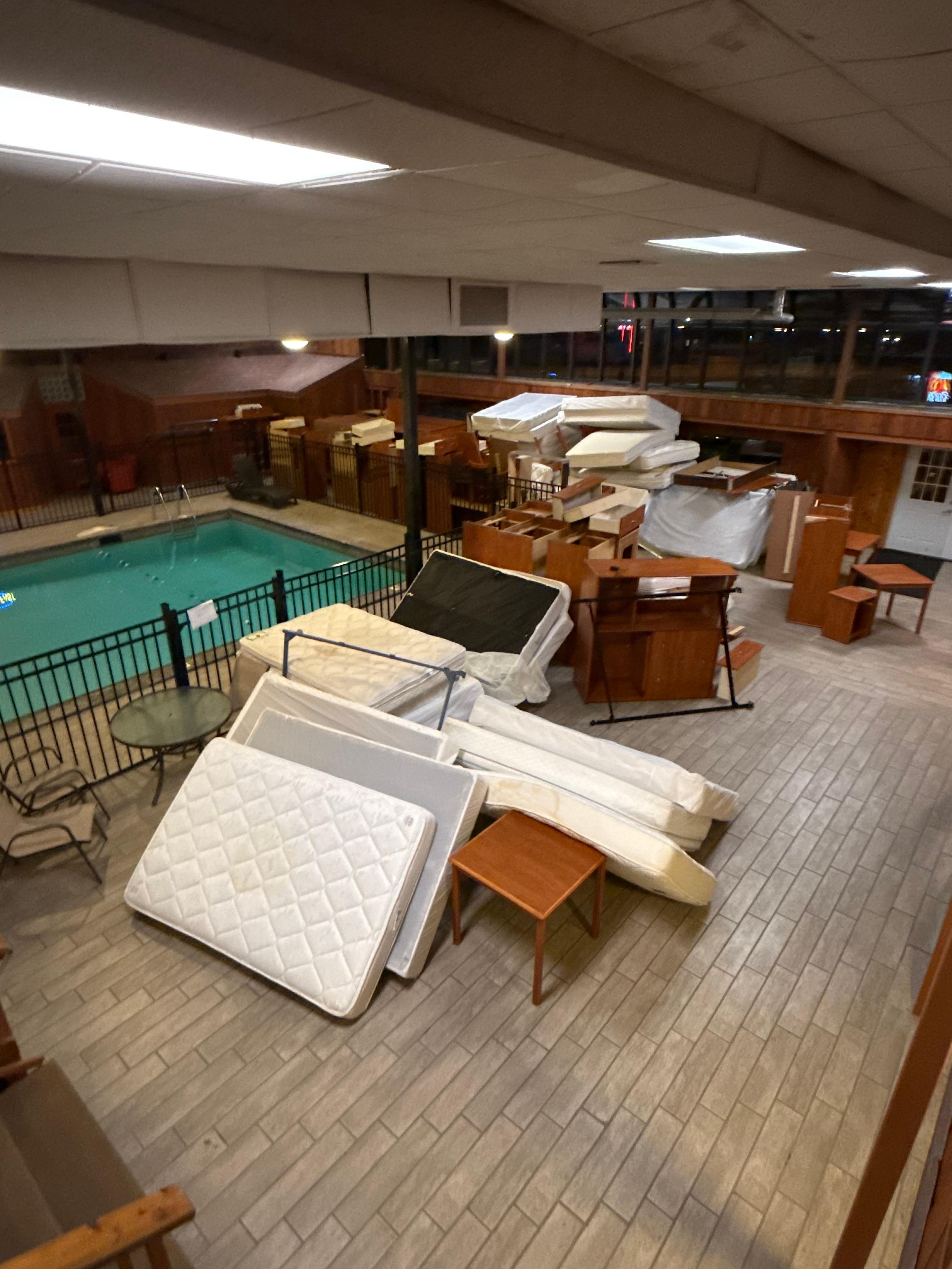 Beds in the walk area to room 