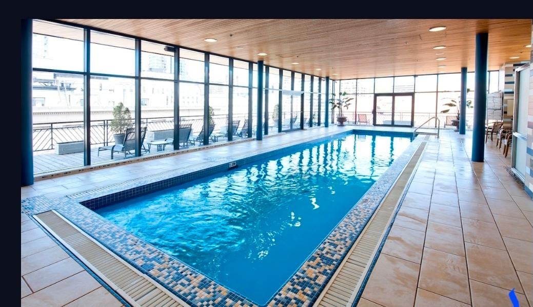 Hotel pool top floor amazing view and great temperature. 