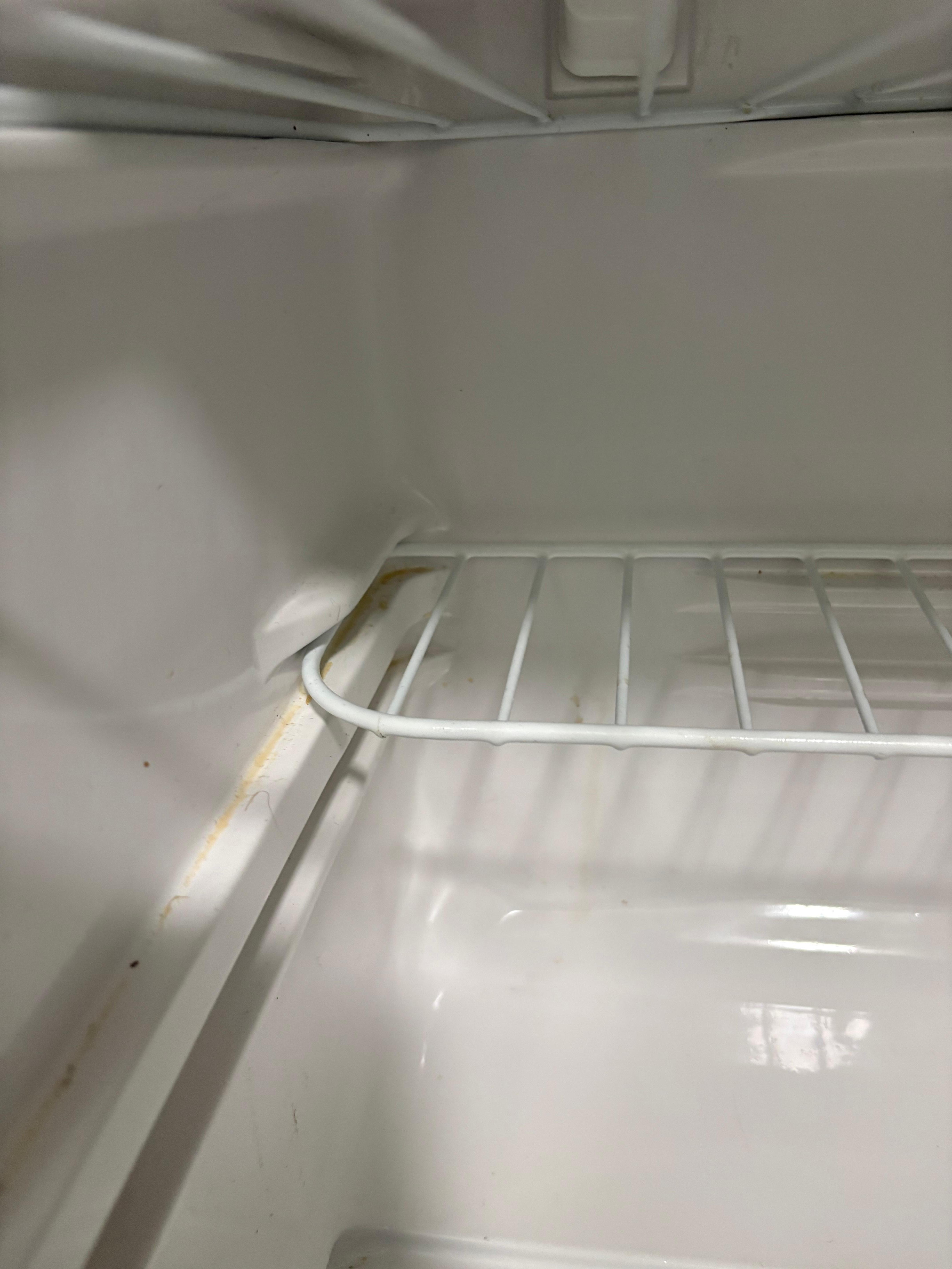 Inside a refrigerator everything was frozen and fridge was not clean