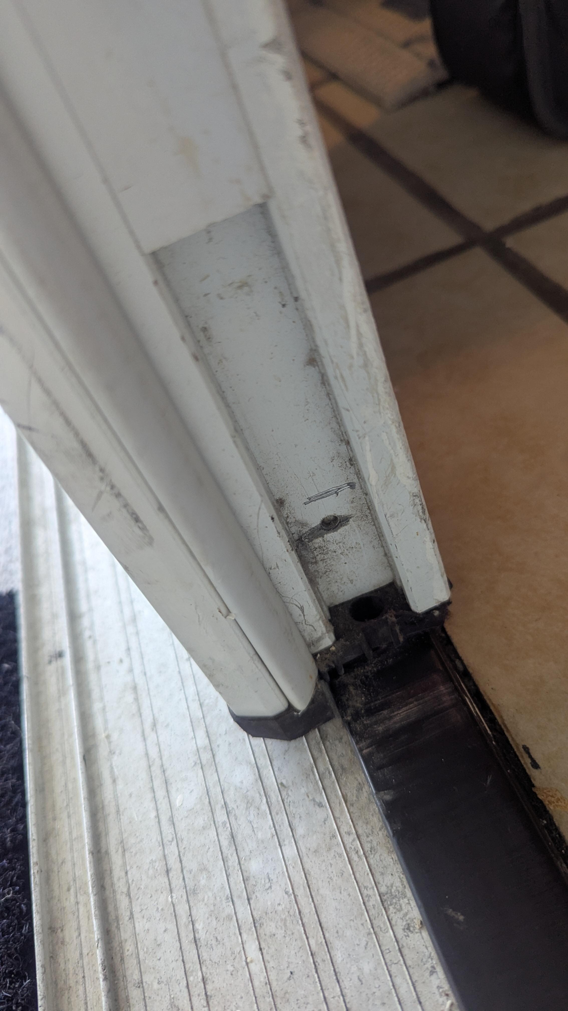 Missing lock pin at bottom of front double doors