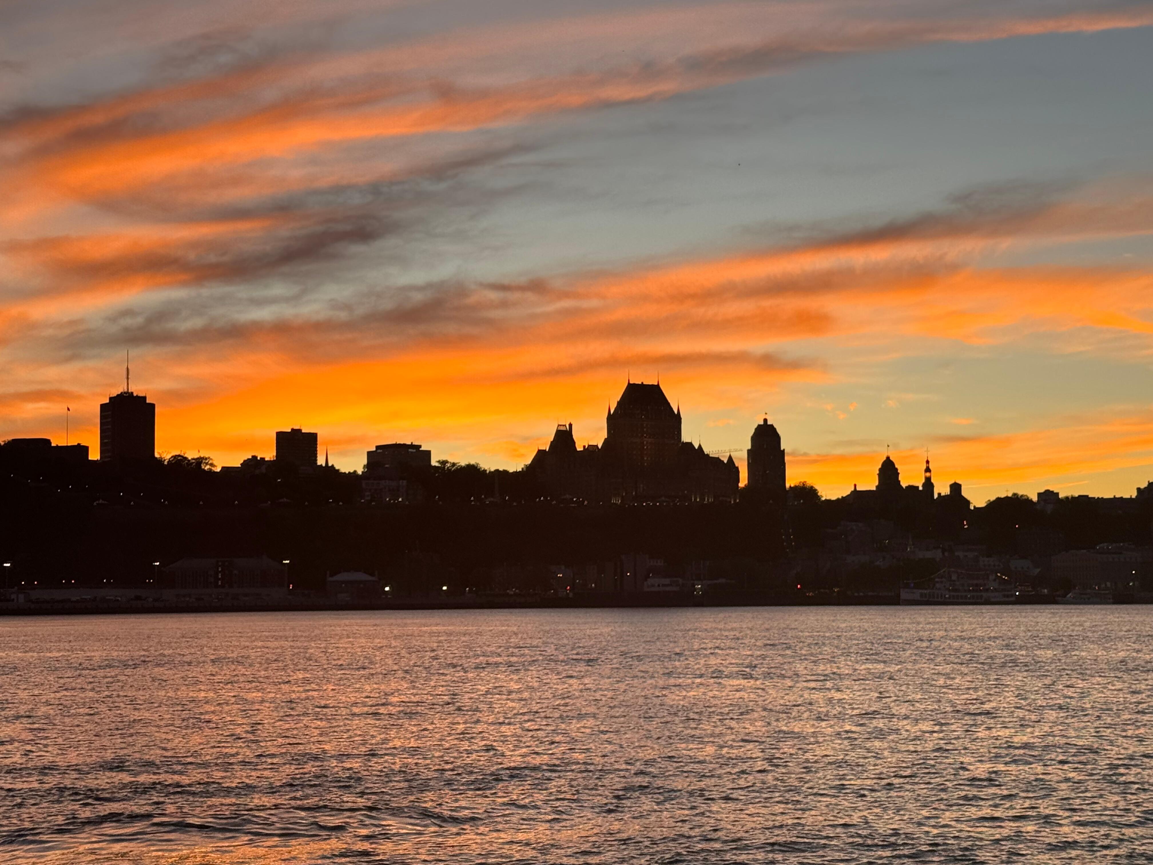 Sunset over old Quebec from the ferry. 
