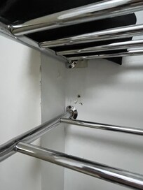 More holes and unfinished dry wall with dirt and mold