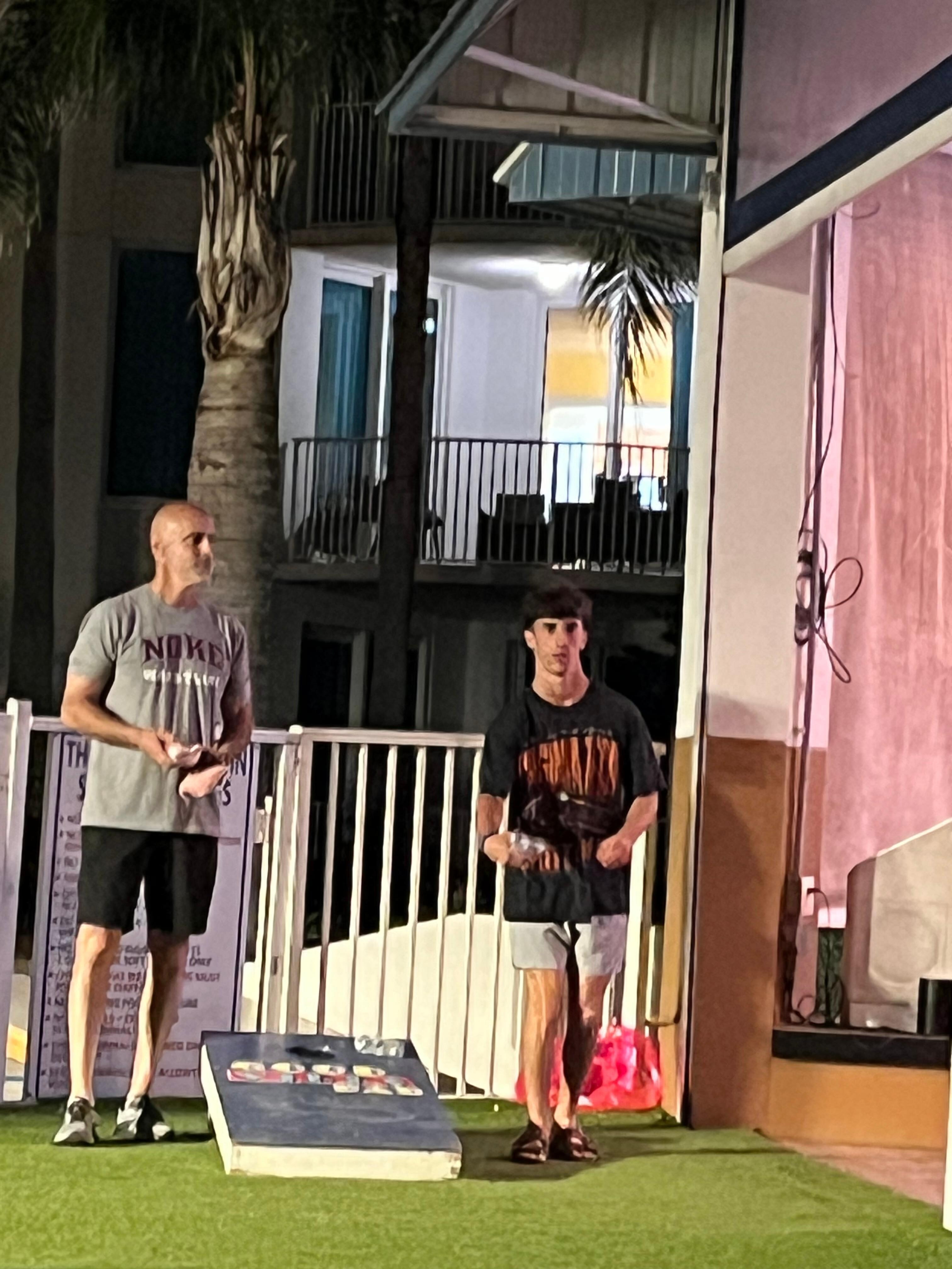 Corn hole by the pool/bistro area