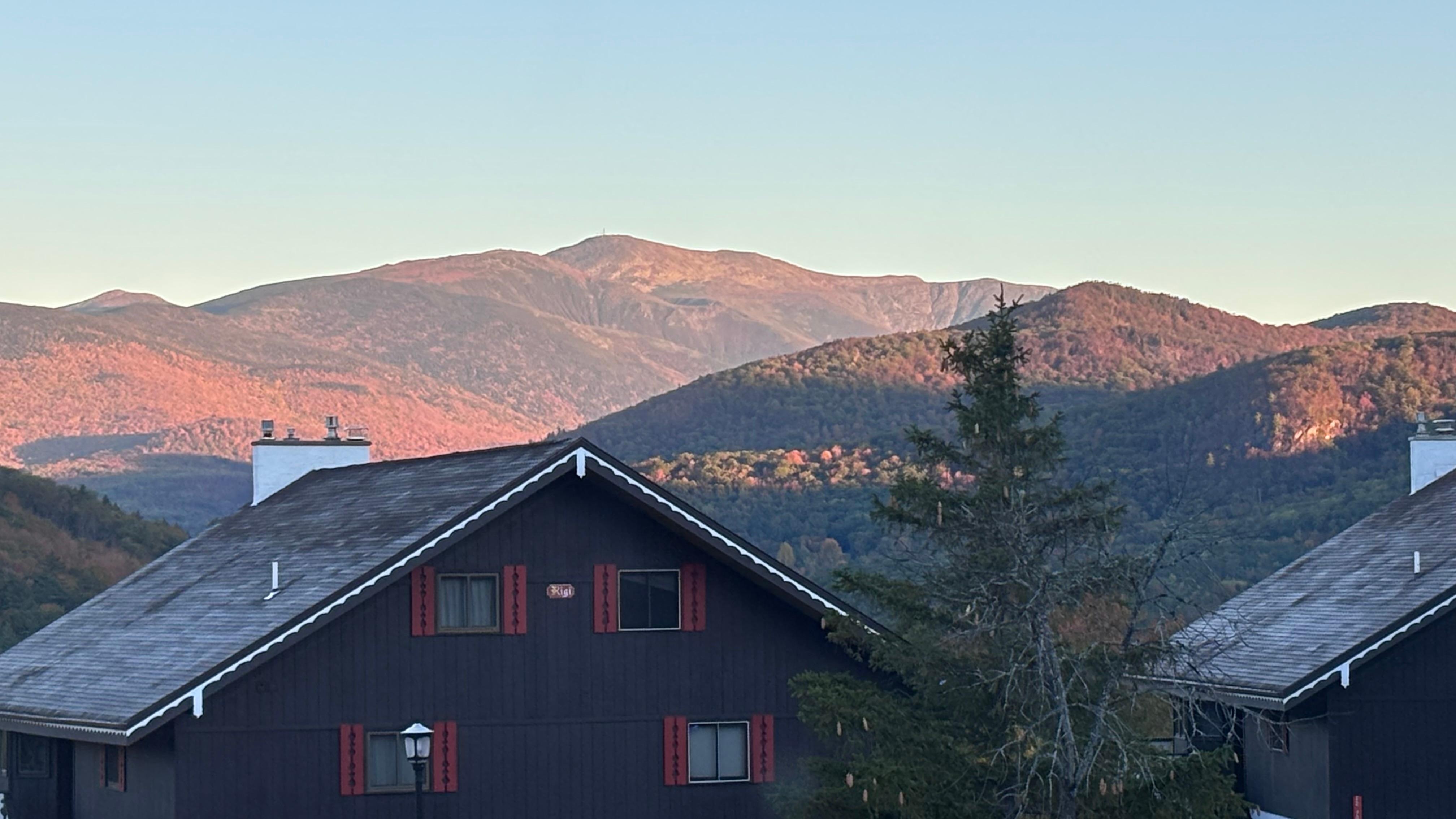 Sunrise view of Mt. Washington from the bay window inside the condo.