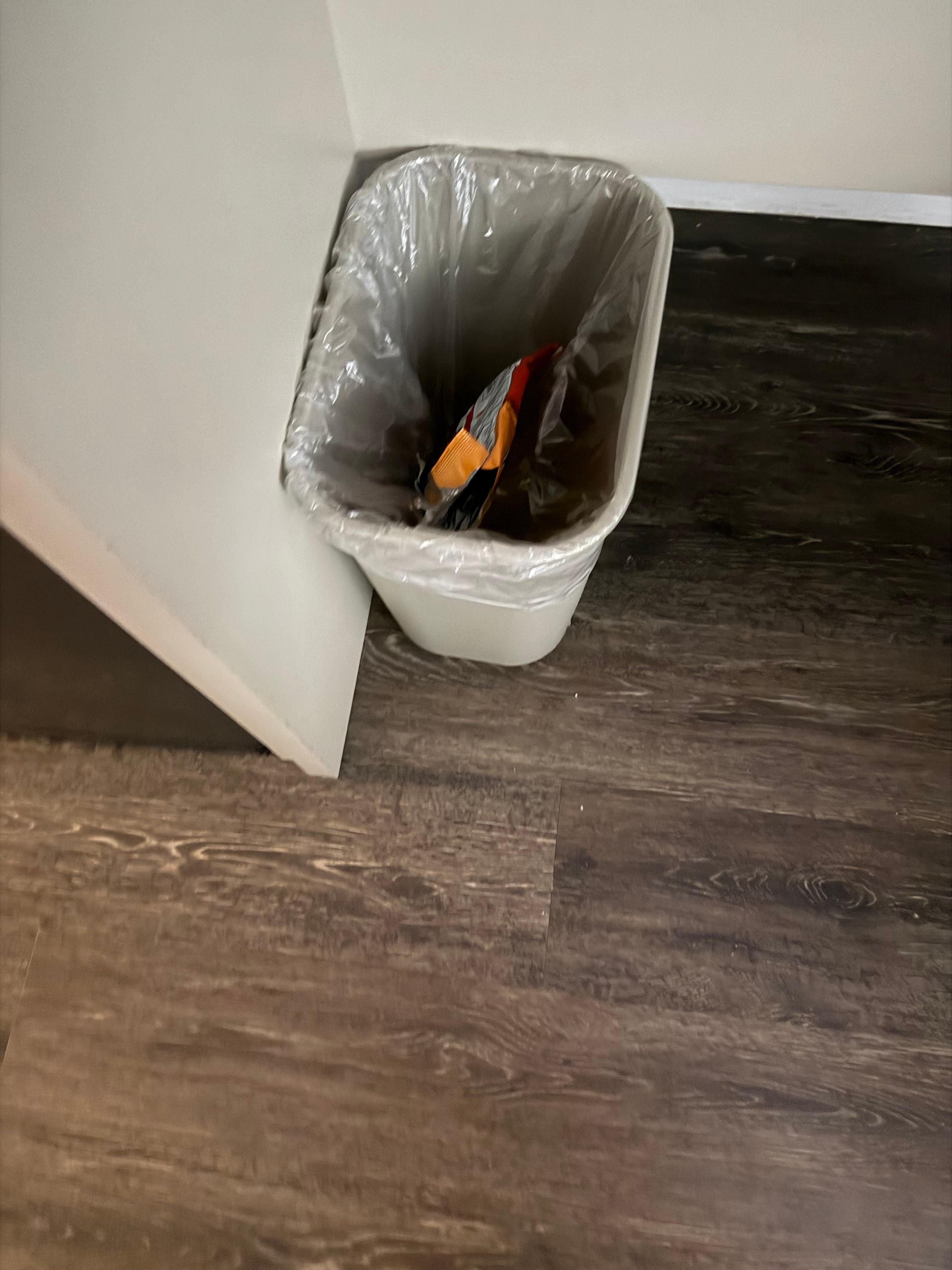 Picture of room that I was given. It was unclean from a previous stay and no one had bothered to clean the trash from a previous stay