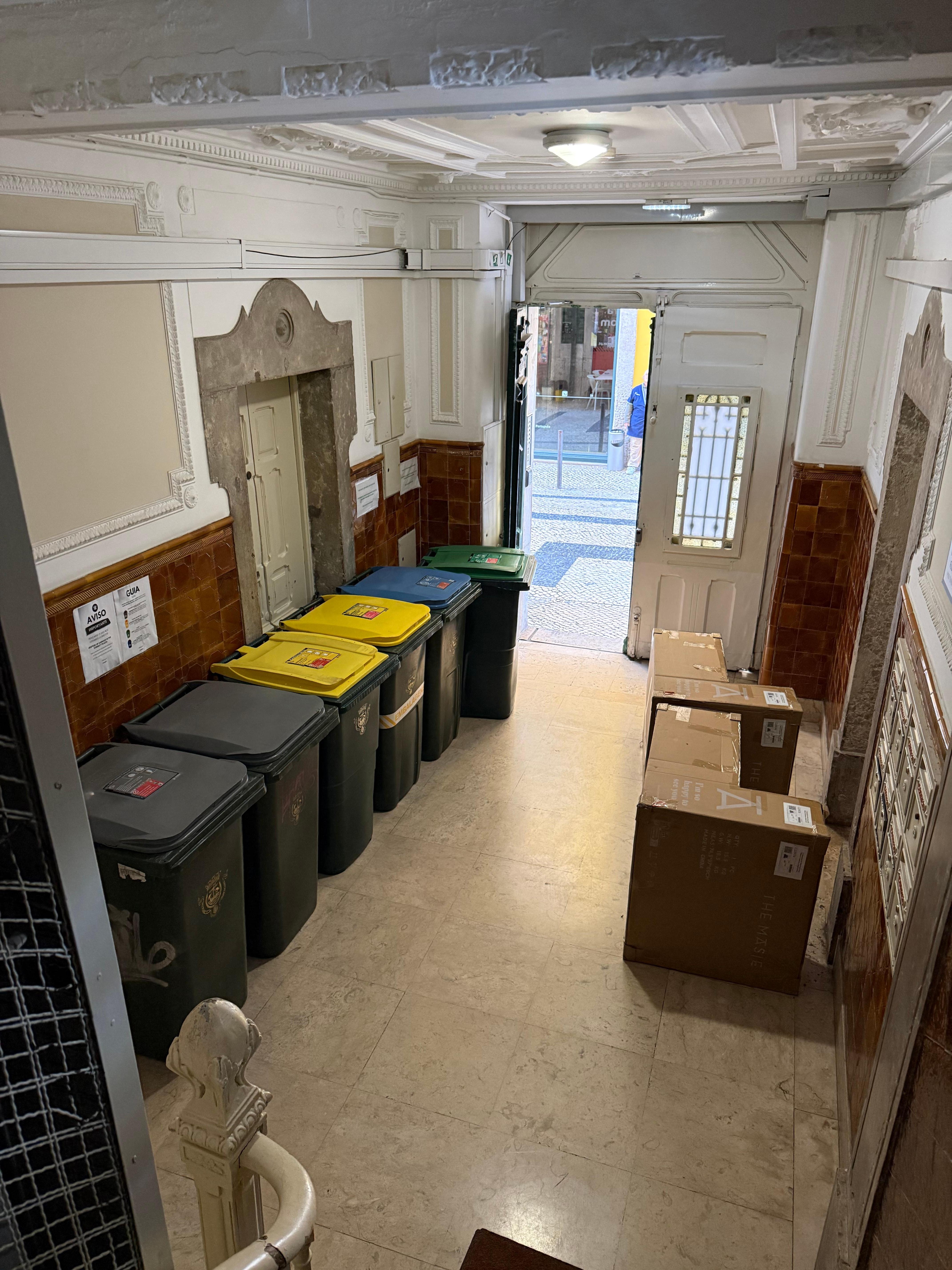 Entrance to building also stores their trash. They didn’t show this in the listing photos. 