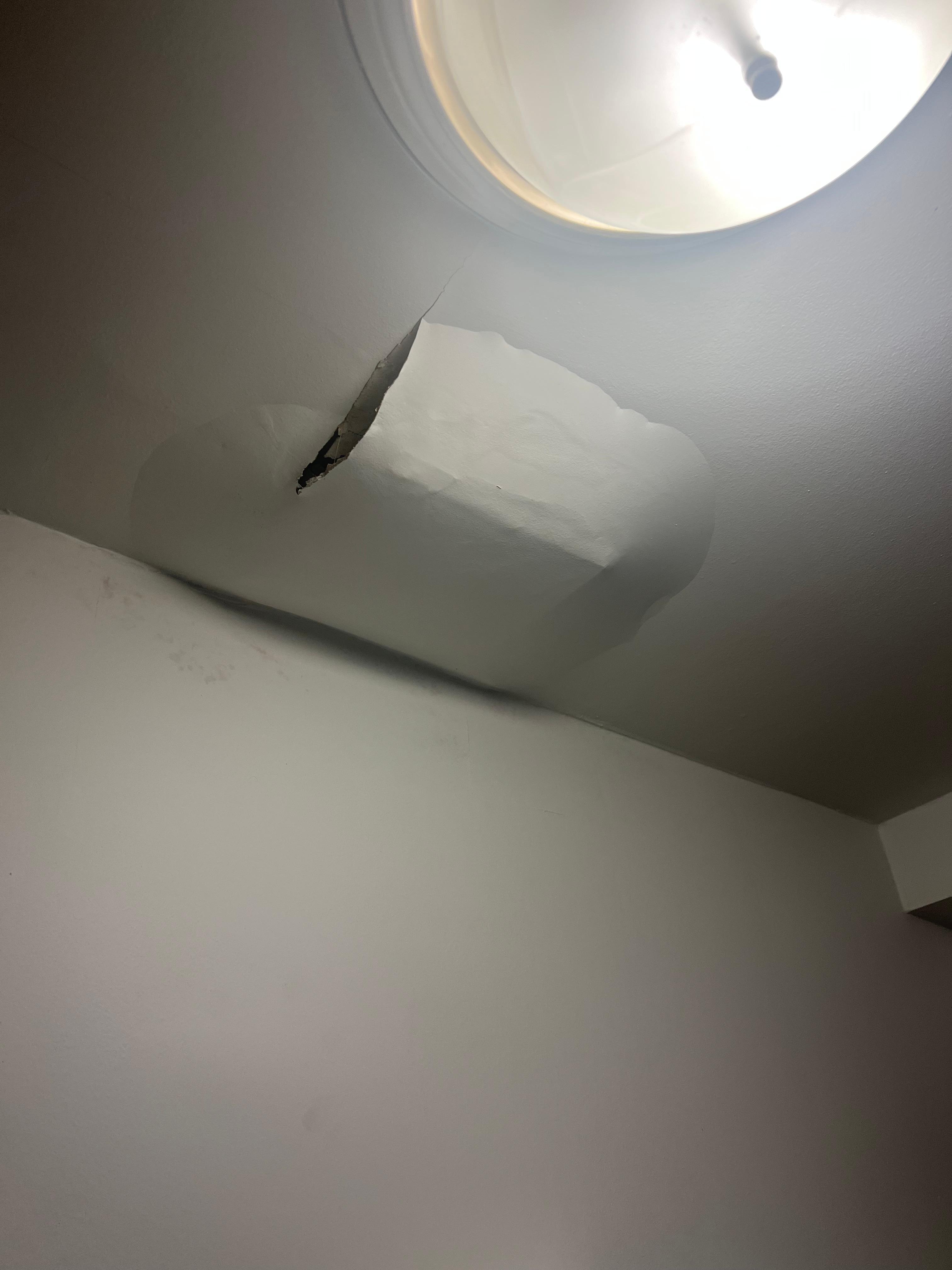 Water damage in ceiling from toilet above