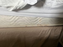 Stains on side of bed