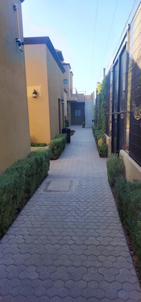 Our trendy little corridor to the rooms, Covina, and pool area.