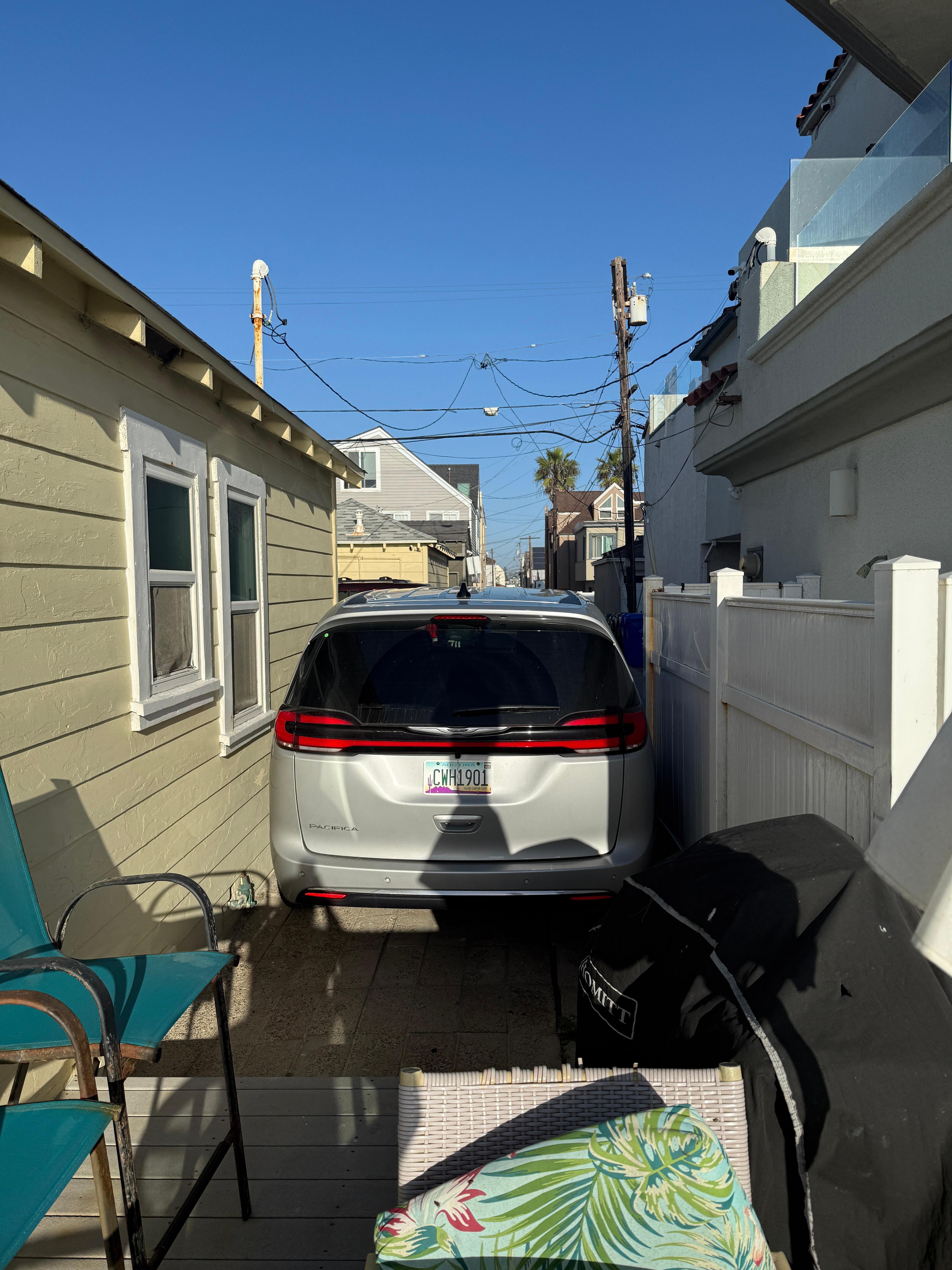 My minivan fit very snuggly. We had to back in and get out of the passenger side door 😆