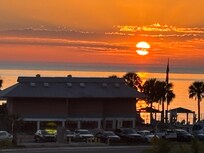 Sunset at Bonita Beach from the 4th floor west railing of the Condo complex.