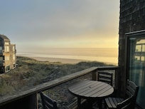 Balcony from the master bedroom with additional seating to enjoy the view!