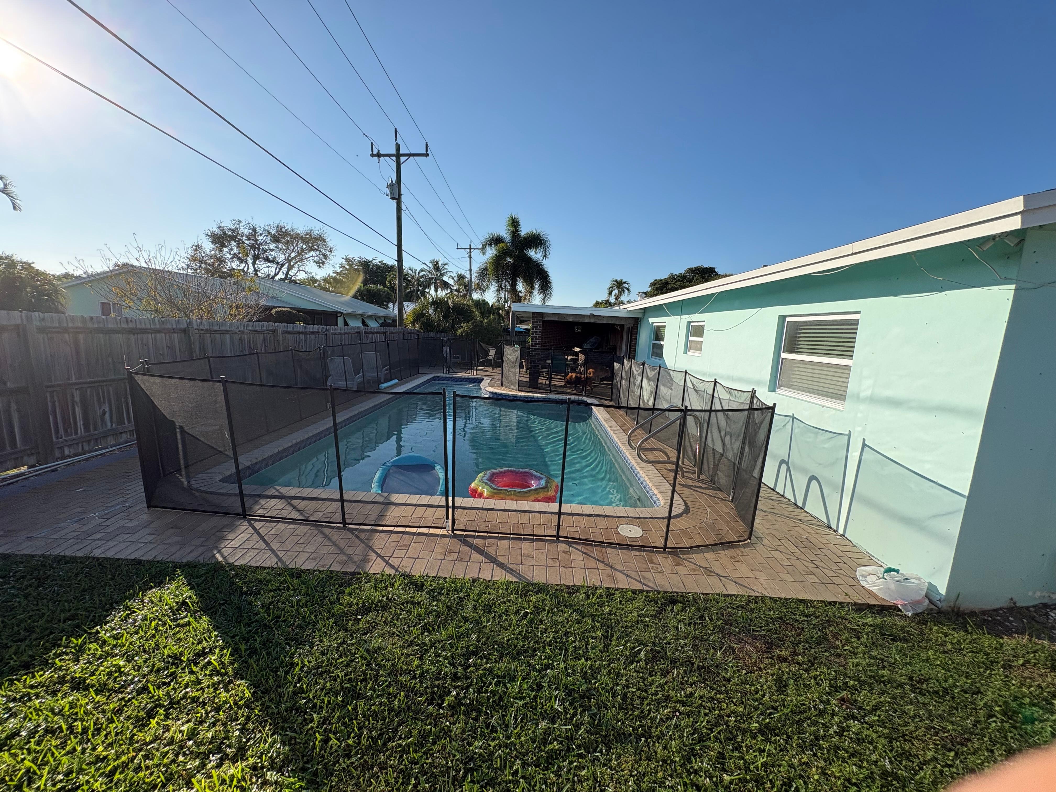 Pool surrounded by fence NOT in any pictures and ruined pool side enjoyment.  