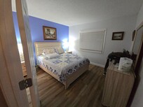 Comfortable queen size bed with en suite bathroom