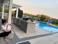 outdoor kitchen and pool