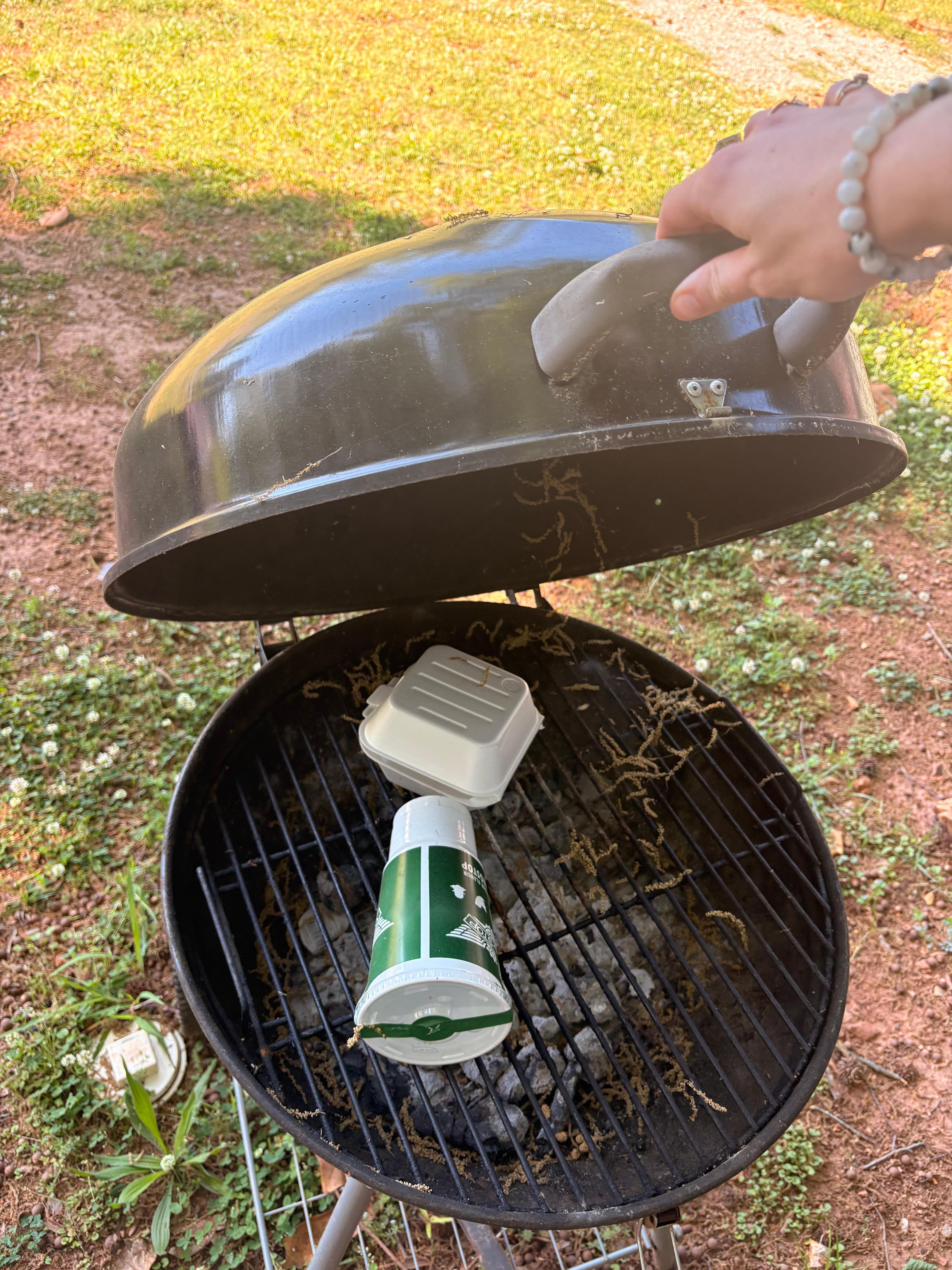 Grill had takeout and other trash in it with a thick layer of pollen and other yard clippings