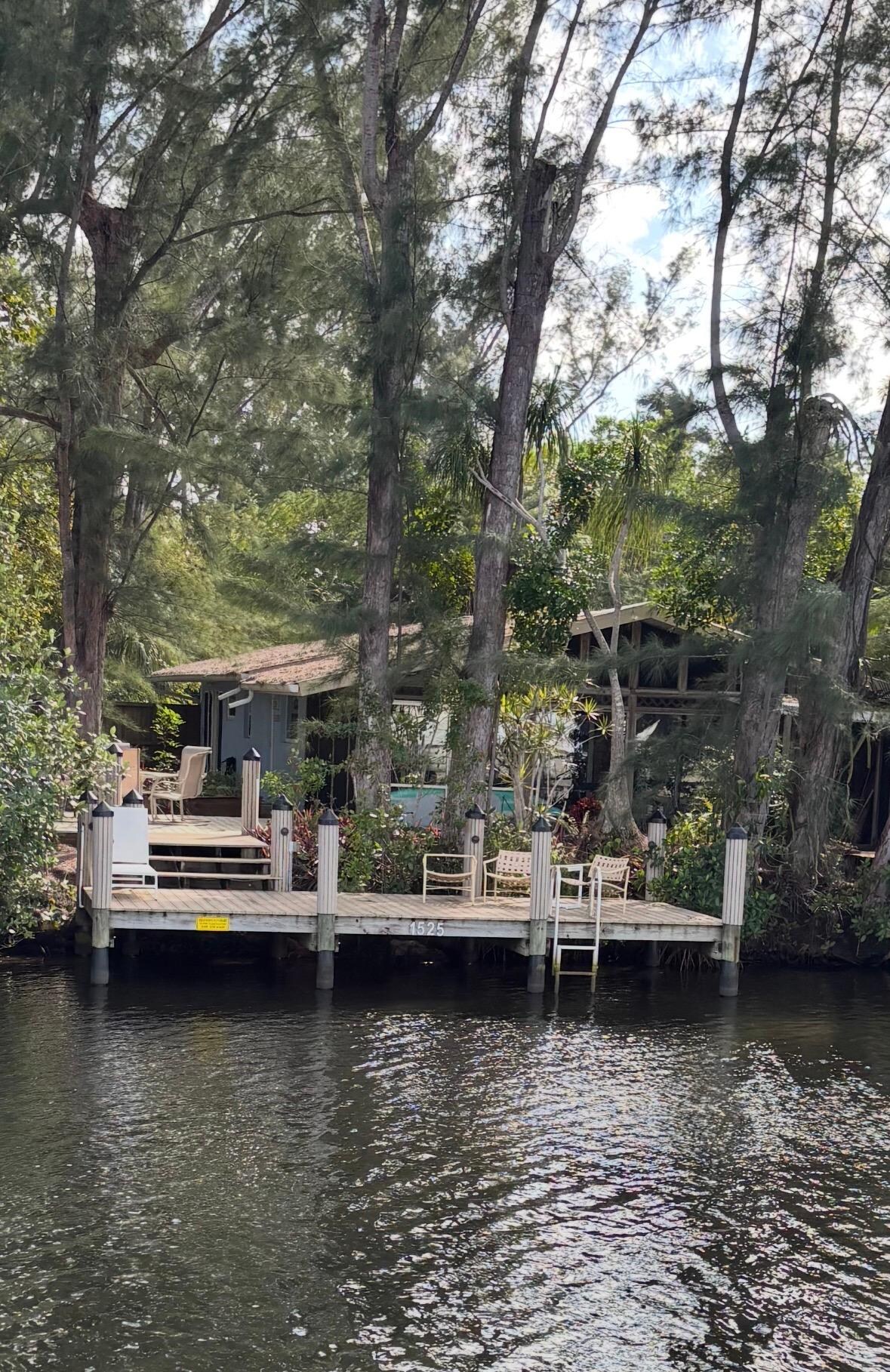 Photo of the home taken from across the canal. 