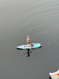 This young man was in his happy place. He spent hours on the lake.