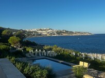 Daytime view from the rooftop overlooking the pool and the town of Castro