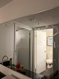 In addition to design on mirror that was halfway removed (we thought it was marker), it had other water streaks all over