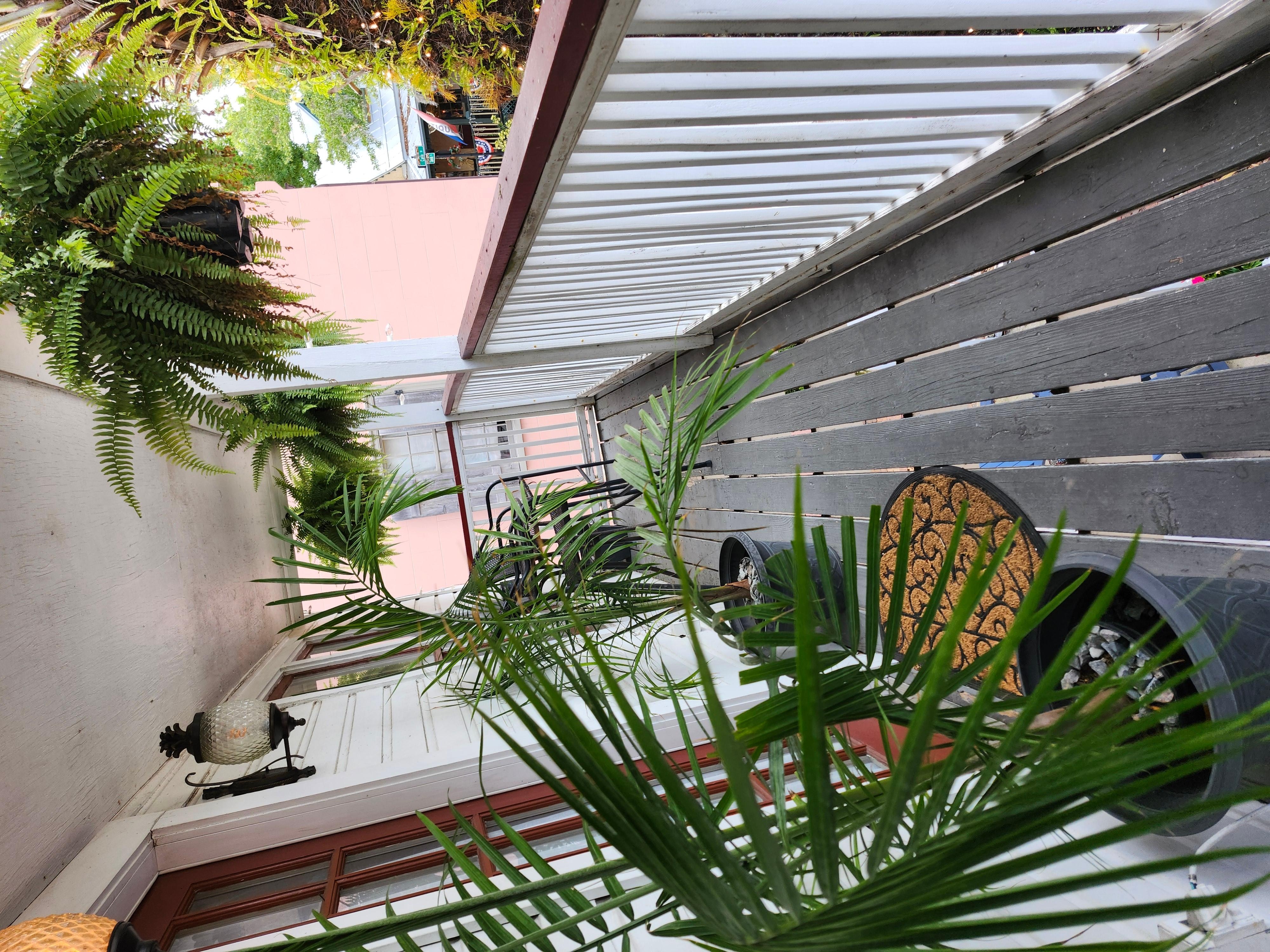 Private front porch for South & North Palm rooms