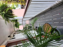 Private front porch for South & North Palm rooms