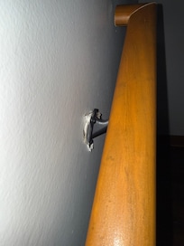 handrail pulling away from wall