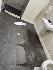 Bathroom flood after turning the shower on for less than a minute