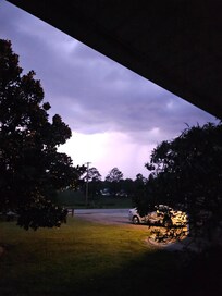 Watching the lightening from the front porch.