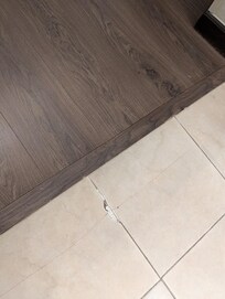 Dangerous flooring out of the bathroom