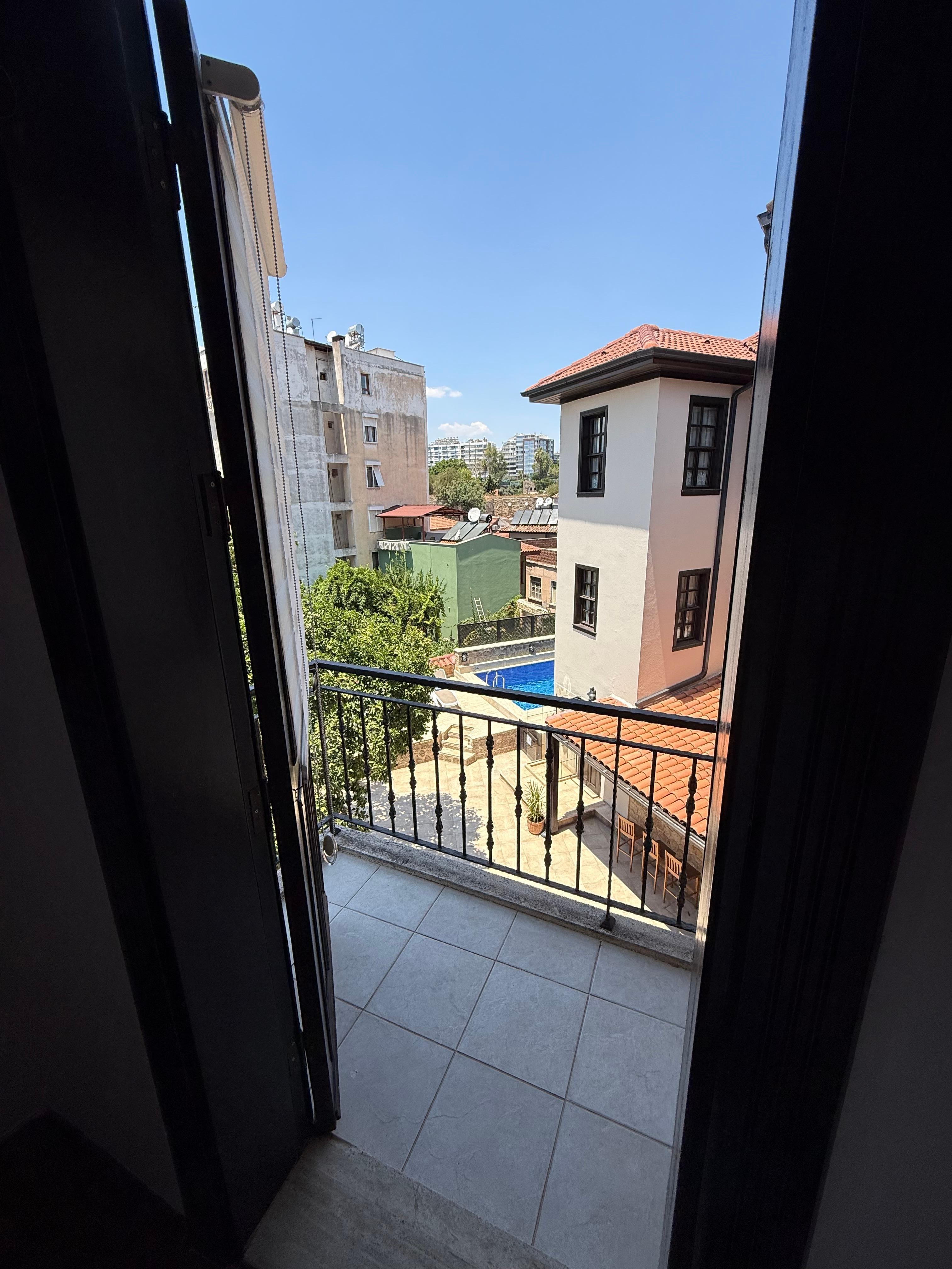 Kamer 201 uitzicht op balkon