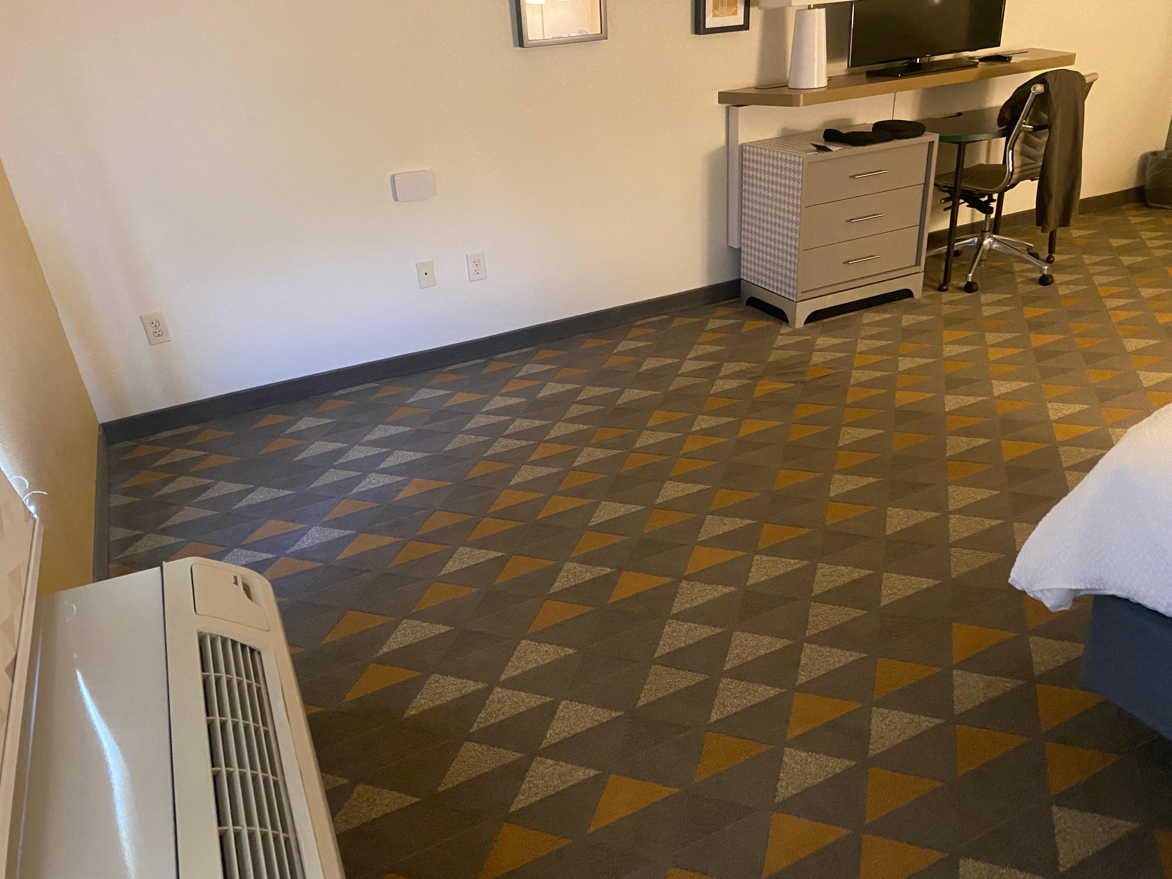 Wide open area that seemed meant for a desk 