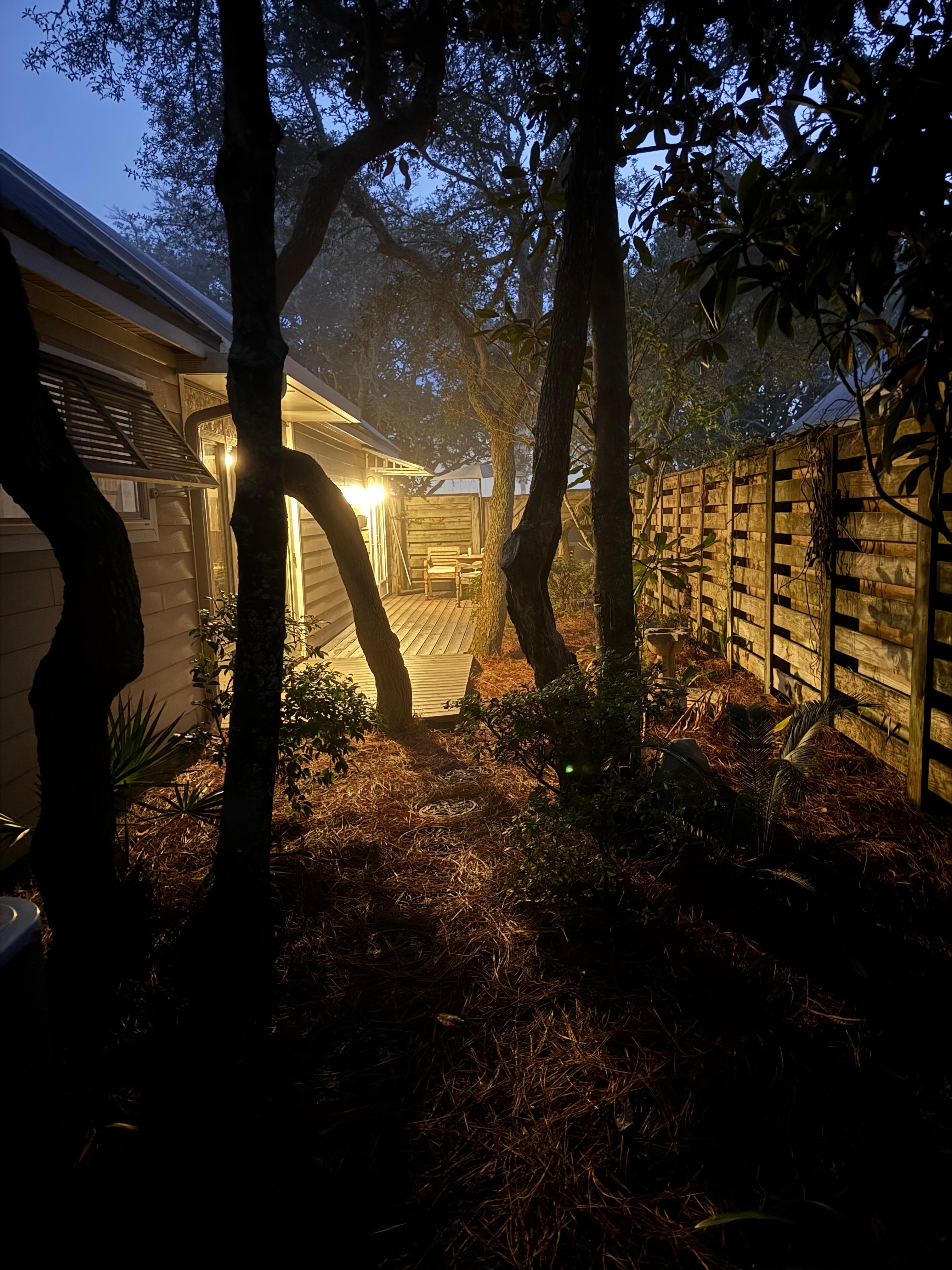 Back patio at night! You can hear the water. 