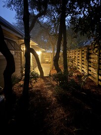 Back patio at night! You can hear the water.