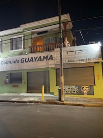 The place closes at night and has security gates because the neighborhood is so bad.