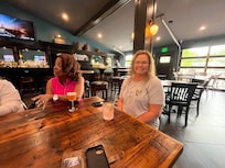 Enjoying large dining table for playing games.